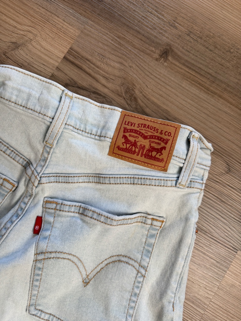 Levi's Light Blue Denim Jeans with Tan Leather Patch